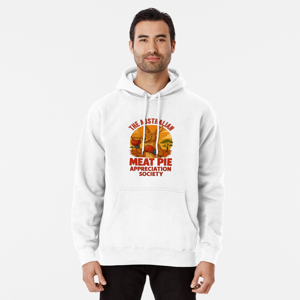 Pullover hoodie with cartoon boxing kangaroo lifting meat pie against vivid outback sunset background