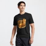 Lightweight moisture-wicking active T-shirt printed with golden Aussie meat pie between boomerang and surfboard against ocean beach backdrop