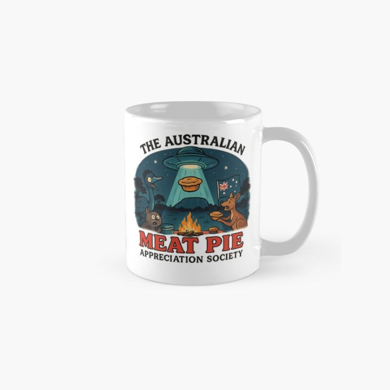 “White ceramic mug printed with UFO beaming up golden Aussie meat pie over bush campfire scene with kangaroo and emu”