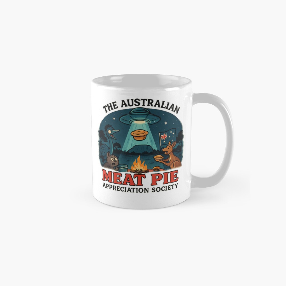 “White ceramic mug printed with UFO beaming up golden Aussie meat pie over bush campfire scene with kangaroo and emu”